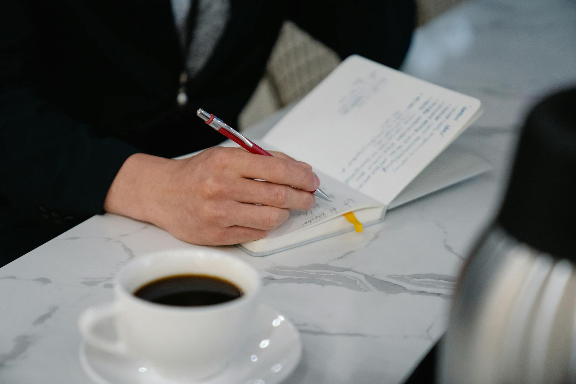 Journal and pen in morning light — anxiety mood mental health