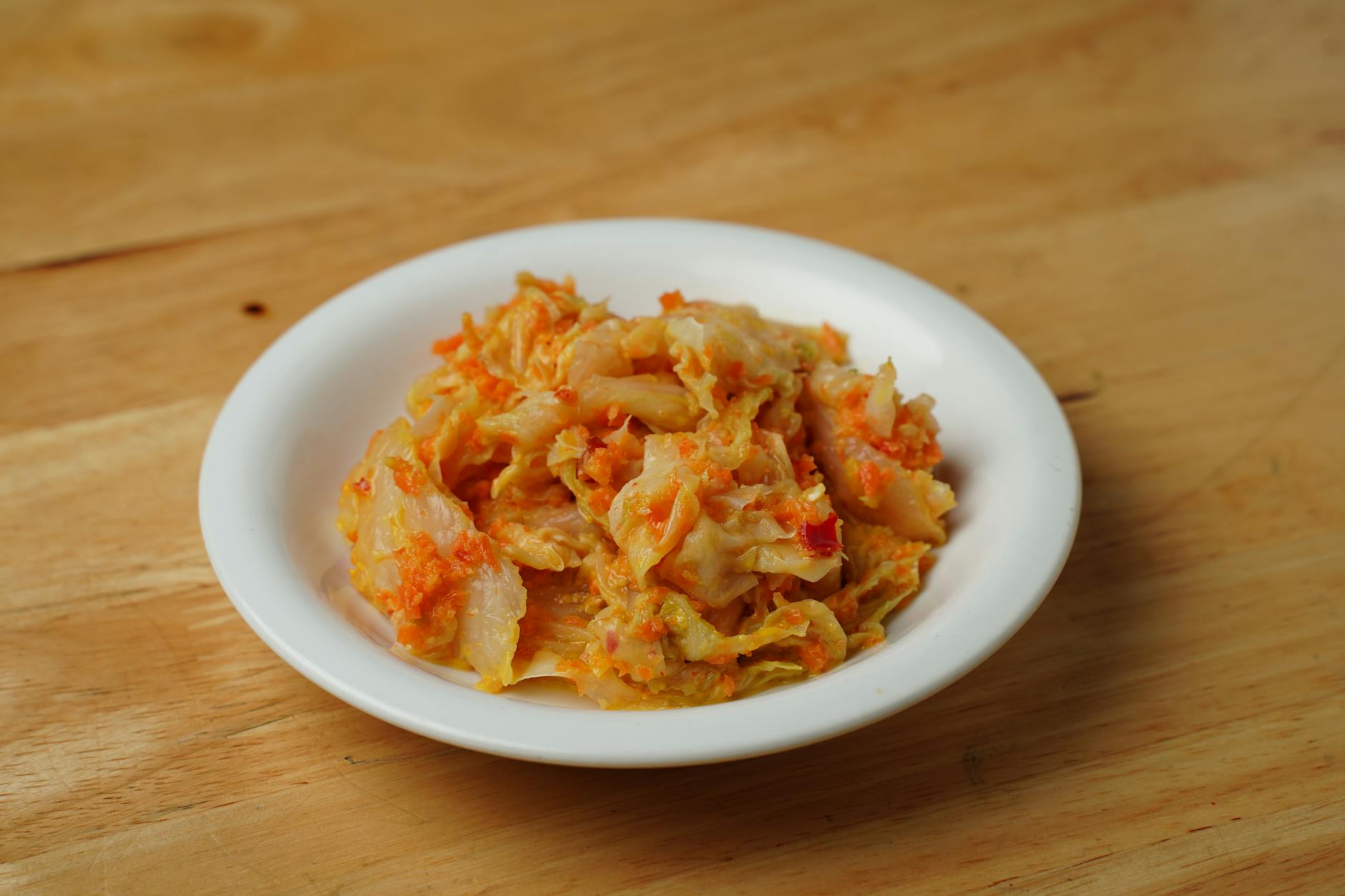 Bowl of fermented food on linen — gut microbiome digestion